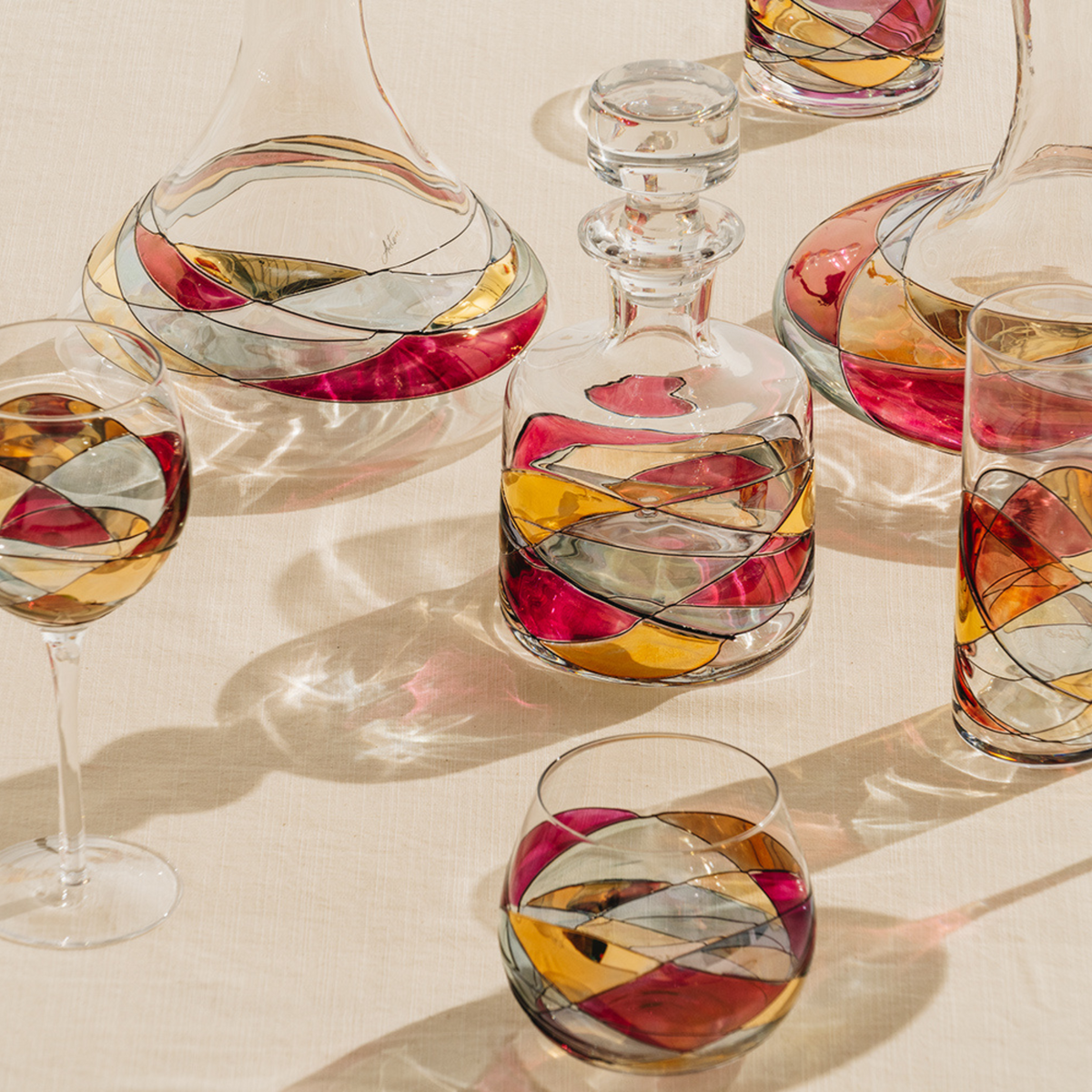 Sagrada Red stemless balloon wine glasses, 21 oz – styled table setting
